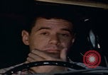 Image of man falling asleep driving San Bernardino California USA, 1967, second 21 stock footage video 65675079704