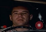 Image of man falling asleep driving San Bernardino California USA, 1967, second 23 stock footage video 65675079704