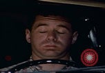 Image of man falling asleep driving San Bernardino California USA, 1967, second 26 stock footage video 65675079704
