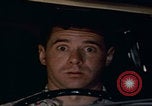 Image of man falling asleep driving San Bernardino California USA, 1967, second 27 stock footage video 65675079704