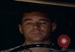 Image of man falling asleep driving San Bernardino California USA, 1967, second 31 stock footage video 65675079704