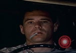 Image of man falling asleep driving San Bernardino California USA, 1967, second 46 stock footage video 65675079704