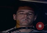 Image of man falling asleep driving San Bernardino California USA, 1967, second 56 stock footage video 65675079704