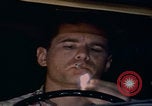 Image of man falling asleep driving San Bernardino California USA, 1967, second 60 stock footage video 65675079704