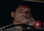 Image of man falling asleep driving San Bernardino California USA, 1967, second 62 stock footage video 65675079704