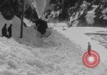 Image of steam locomotive clears snow Silverton Colorado USA, 1932, second 16 stock footage video 65675079706