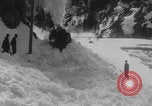 Image of steam locomotive clears snow Silverton Colorado USA, 1932, second 18 stock footage video 65675079706