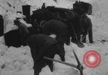 Image of steam locomotive clears snow Silverton Colorado USA, 1932, second 39 stock footage video 65675079706