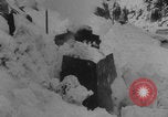 Image of steam locomotive clears snow Silverton Colorado USA, 1932, second 51 stock footage video 65675079706