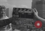 Image of couple in formal 60s fashions New York City USA, 1960, second 1 stock footage video 65675079724