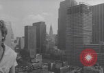 Image of couple in formal 60s fashions New York City USA, 1960, second 6 stock footage video 65675079724
