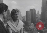 Image of couple in formal 60s fashions New York City USA, 1960, second 8 stock footage video 65675079724