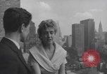 Image of couple in formal 60s fashions New York City USA, 1960, second 9 stock footage video 65675079724