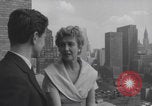 Image of couple in formal 60s fashions New York City USA, 1960, second 10 stock footage video 65675079724