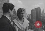 Image of couple in formal 60s fashions New York City USA, 1960, second 11 stock footage video 65675079724