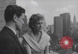 Image of couple in formal 60s fashions New York City USA, 1960, second 12 stock footage video 65675079724