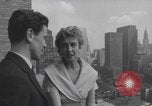 Image of couple in formal 60s fashions New York City USA, 1960, second 13 stock footage video 65675079724