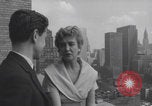 Image of couple in formal 60s fashions New York City USA, 1960, second 15 stock footage video 65675079724