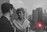 Image of couple in formal 60s fashions New York City USA, 1960, second 16 stock footage video 65675079724