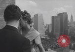 Image of couple in formal 60s fashions New York City USA, 1960, second 17 stock footage video 65675079724
