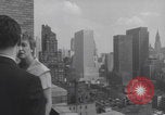 Image of couple in formal 60s fashions New York City USA, 1960, second 18 stock footage video 65675079724