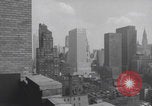 Image of couple in formal 60s fashions New York City USA, 1960, second 27 stock footage video 65675079724