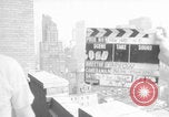 Image of couple in formal 60s fashions New York City USA, 1960, second 28 stock footage video 65675079724