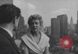 Image of couple in formal 60s fashions New York City USA, 1960, second 35 stock footage video 65675079724