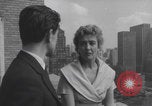 Image of couple in formal 60s fashions New York City USA, 1960, second 37 stock footage video 65675079724
