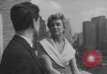 Image of couple in formal 60s fashions New York City USA, 1960, second 40 stock footage video 65675079724