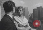 Image of couple in formal 60s fashions New York City USA, 1960, second 41 stock footage video 65675079724