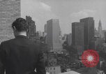Image of couple in formal 60s fashions New York City USA, 1960, second 46 stock footage video 65675079724