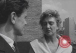 Image of couple in formal 60s fashions New York City USA, 1960, second 52 stock footage video 65675079724