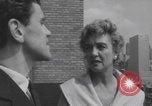 Image of couple in formal 60s fashions New York City USA, 1960, second 53 stock footage video 65675079724
