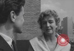 Image of couple in formal 60s fashions New York City USA, 1960, second 55 stock footage video 65675079724