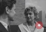 Image of couple in formal 60s fashions New York City USA, 1960, second 57 stock footage video 65675079724