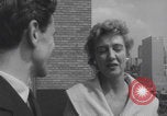 Image of couple in formal 60s fashions New York City USA, 1960, second 62 stock footage video 65675079724