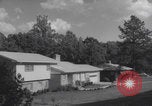 Image of African American suburban mother with children Atlanta Georgia USA, 1960, second 5 stock footage video 65675079731