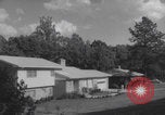 Image of African American suburban mother with children Atlanta Georgia USA, 1960, second 7 stock footage video 65675079731