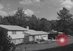 Image of African American suburban mother with children Atlanta Georgia USA, 1960, second 9 stock footage video 65675079731