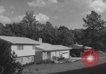 Image of African American suburban mother with children Atlanta Georgia USA, 1960, second 14 stock footage video 65675079731