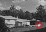 Image of African American suburban mother with children Atlanta Georgia USA, 1960, second 16 stock footage video 65675079731