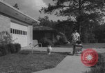 Image of African American suburban mother with children Atlanta Georgia USA, 1960, second 17 stock footage video 65675079731