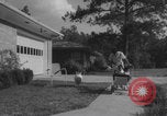 Image of African American suburban mother with children Atlanta Georgia USA, 1960, second 23 stock footage video 65675079731