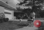 Image of African American suburban mother with children Atlanta Georgia USA, 1960, second 27 stock footage video 65675079731