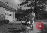 Image of African American suburban mother with children Atlanta Georgia USA, 1960, second 29 stock footage video 65675079731