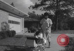 Image of African American suburban mother with children Atlanta Georgia USA, 1960, second 30 stock footage video 65675079731