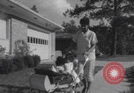 Image of African American suburban mother with children Atlanta Georgia USA, 1960, second 31 stock footage video 65675079731