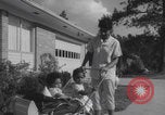 Image of African American suburban mother with children Atlanta Georgia USA, 1960, second 33 stock footage video 65675079731