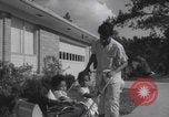 Image of African American suburban mother with children Atlanta Georgia USA, 1960, second 34 stock footage video 65675079731